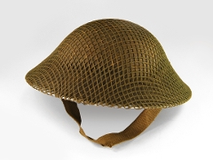 Khaki green, metal domed helmet with khaki mesh overlay and dark tan woven chin strap. To magnify click now