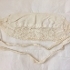 Bonnet laid flat showing lace panel