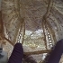 Bonnet being held up to light so writing can be seen