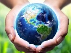 Hands holding our planet
