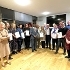 the mayor and winners of this years awards standing with their award certificates