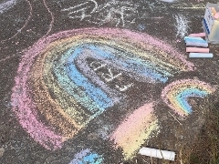 Rainbow chalk on pavement