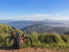 A person sat by their bike