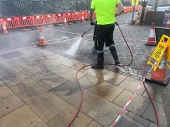 Chewing gum cleaning, North Street Chewing gum being cleaned off the pavement in North Street, Guildford
