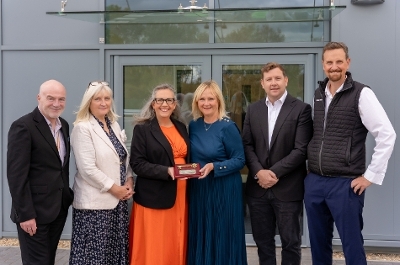 Picture of Lead Councillors, Officers, McLaren Director and Project Manager handing over key outside new Weyside Depot